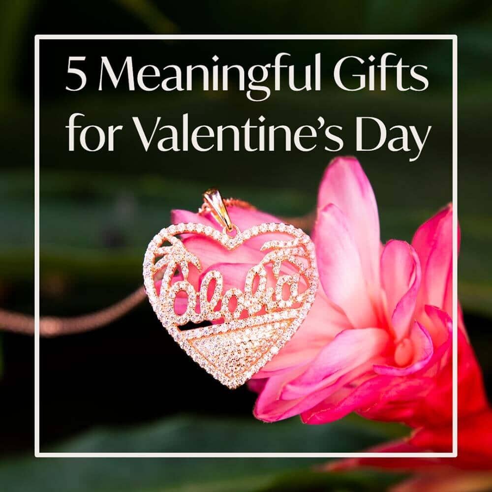 5 meaningful gifts for Valentine's Day featuring a rose gold heart shaped pendant lined with diamonds with Aloha writing and palm trees inside the heart