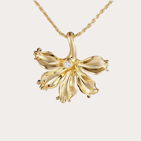 14K gold pendant featuring naupaka flower motif with diamond