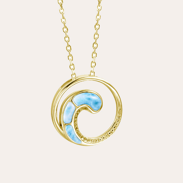 larimar collection featuring 14k gold wave pendant and ocean blue larimar