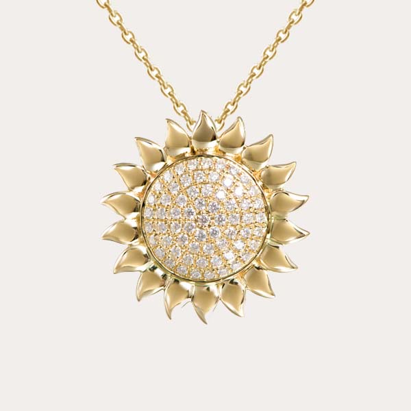 diamond 14K gold collection featuring yellow gold sunflower pendant lined with diamonds