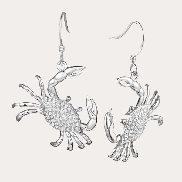diamond sea life collection featuring white gold crab hook earrings lined with diamonds