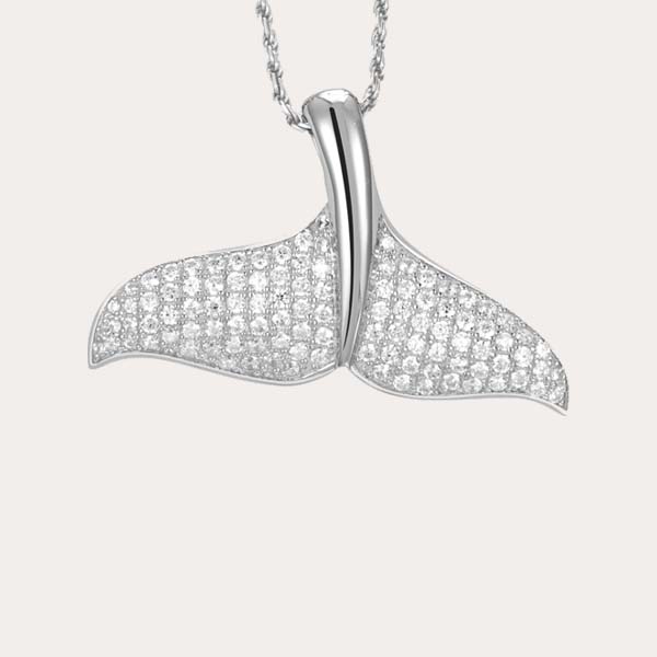 diamond whale tail collection featuring white gold whale tail pendant lined with diamonds