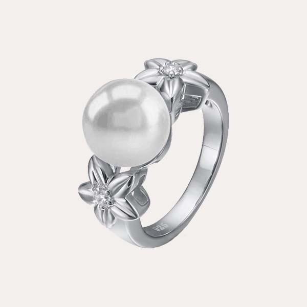 garden pearl collection features a white pearl set in 925 sterling silver ring with plumeria designs