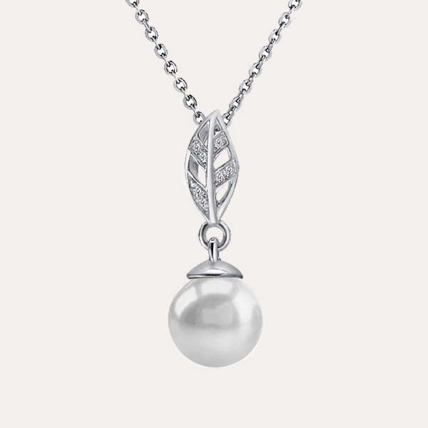 garden pendant collection featuring a Maile leaf pendant with white topaz and a white pearl at the end