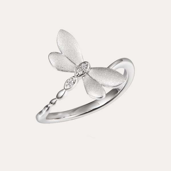 garden ring collection featuring a silver butterfly ring with white topaz
