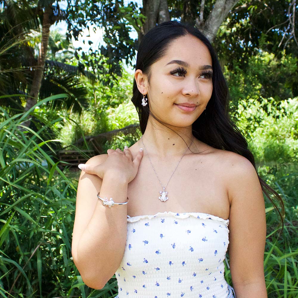 shop the look featuring silver pavé coqui frog jewelry set of earrings, pendant and bangle