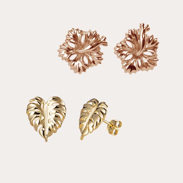 island lifestyle gold collection features a pair of rose gold hibiscus flower stud earrings and a pair of yellow gold monstera leaf stud earrings 