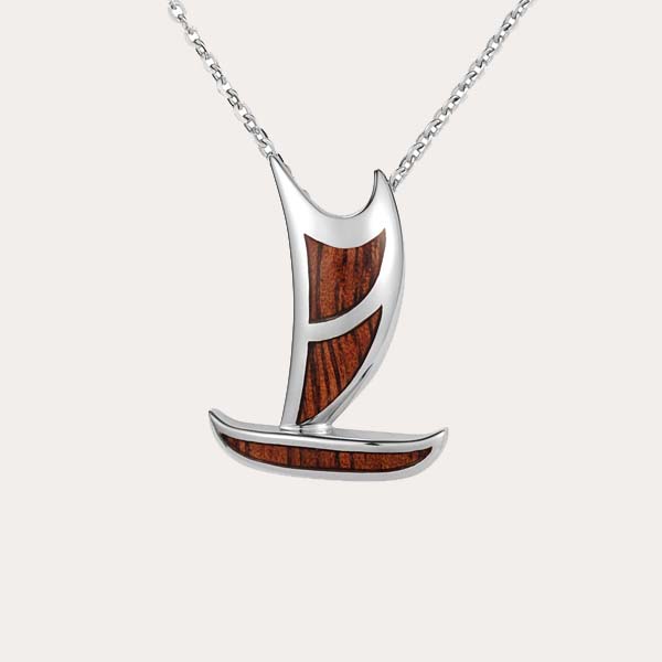 island lifestyle koa wood collection features a traditional Hawaiian canoe boat pendant with koa wood