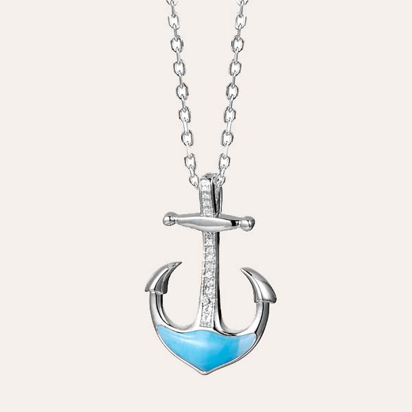 island lifestyle Larimar collection features an anchor pendant with ocean blue Larimar and white topaz gemstones