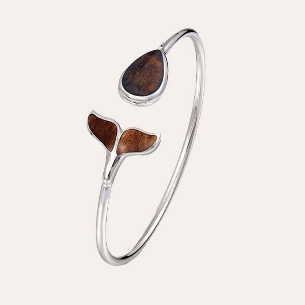 koa wood flexi bangle featuring whale tail motif