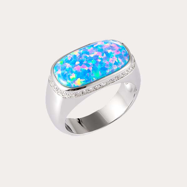 sustainable opal ring collection featuring a silver opal ring with white topaz on the edges