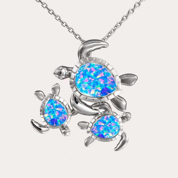 sustainable blue opal pendant featuring three sea turtles