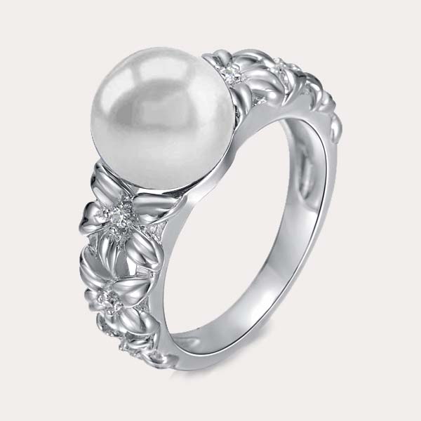 pearl ring collection featuring gardening ring a central white freshwater pearl and gardening flowers with white topaz engraved around the ring