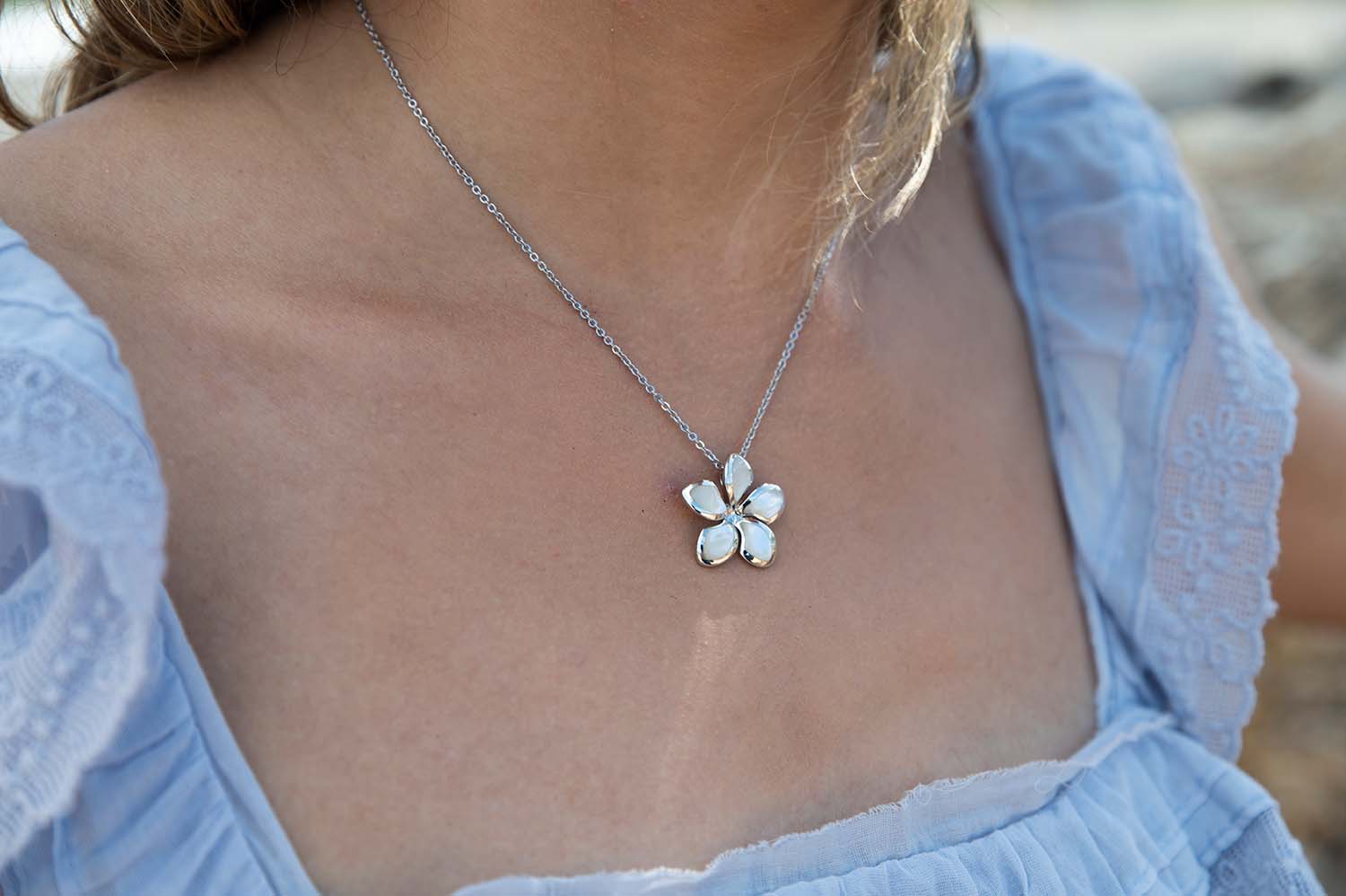 mother of pearl sunrise plumeria flower pendant