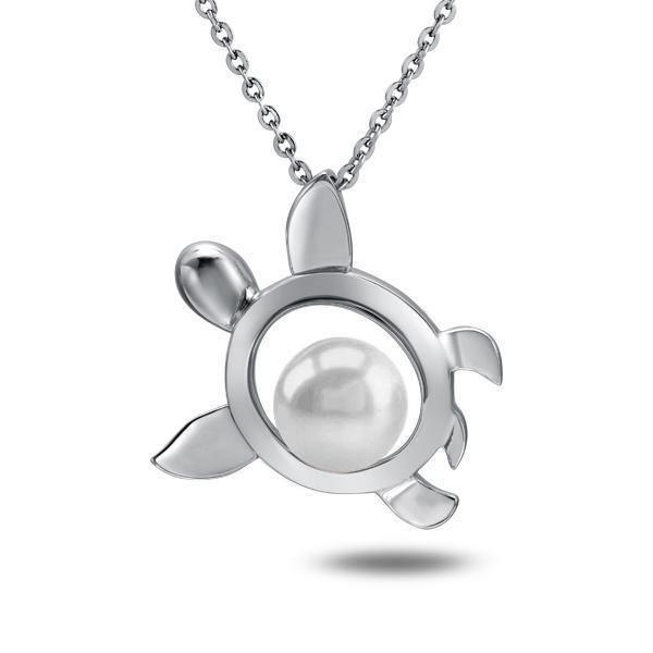 In this photo there is a white gold sea turtle pendant with one white pearl.
