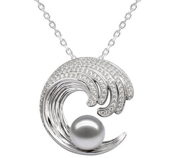 In this photo there is a white gold wave pendant with diamonds and one white pearl.