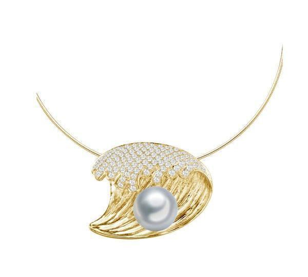 In this photo there is a yellow gold wave pendant with diamonds and one white pearl.