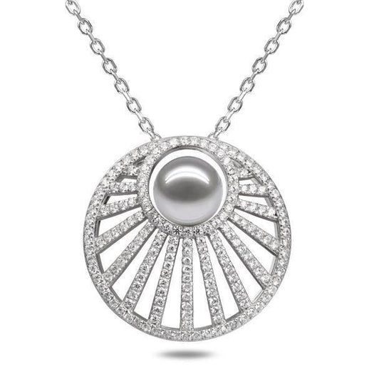 In this photo there is a white gold sun rays pendant with one white pearl and lined with diamonds.