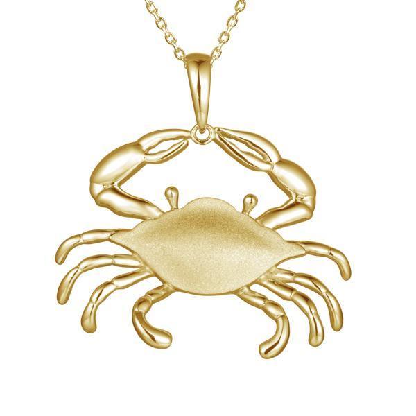 The picture shows a 14K yellow gold blue crab pendant in a large size.