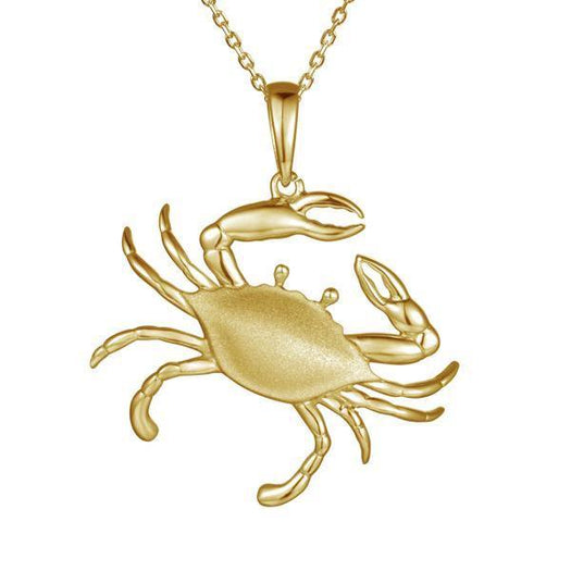 The picture shows a large 14K yellow gold blue crab pendant.
