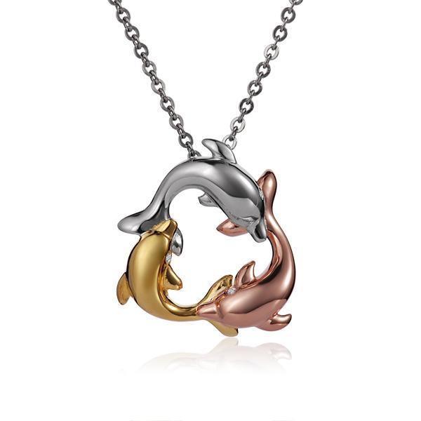 The picture shows a 14K yellow, white, and rose gold three dolphin pendant.