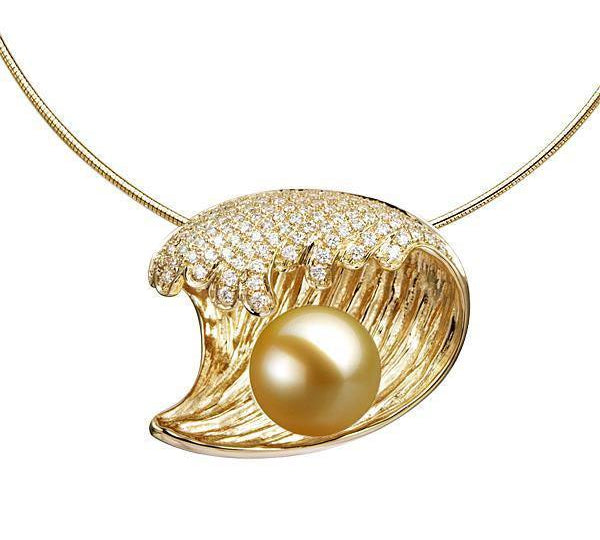 In this photo there is a yellow gold wave pendant with diamonds and one golden south sea pearl.