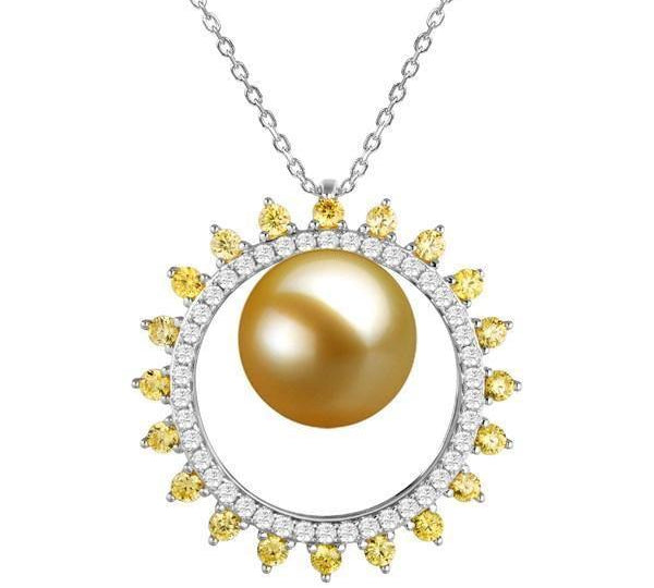 In this photo there is a white gold sun pendant with white and yellow diamonds and one golden south sea pearl.