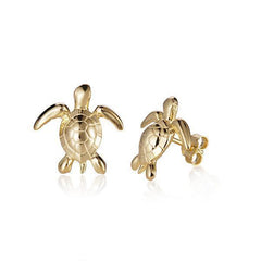 The picture shows a pair of small 14K yellow gold sea turtle earrings.