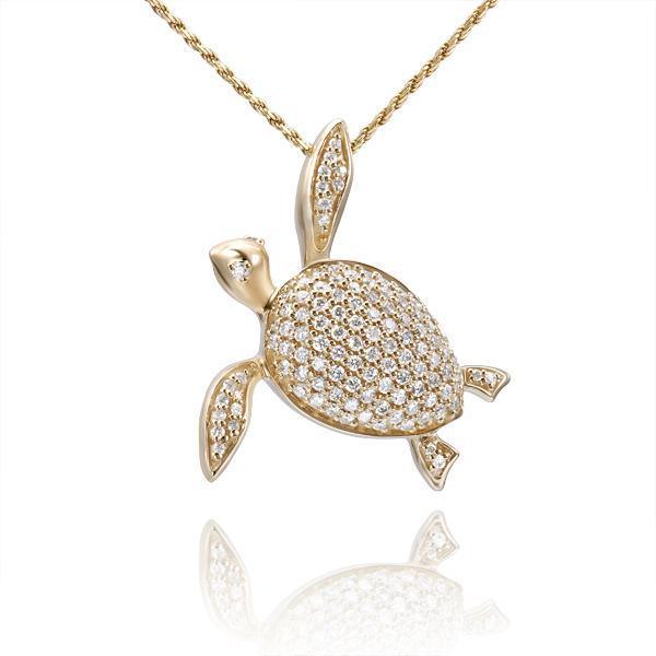 The picture shows a 14K yellow gold sea turtle pendant with diamonds.