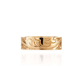 The picture shows a 14K yellow gold sea turtle naupaka 6 mm ring.