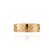 The picture shows a 14K yellow gold sea turtle naupaka 6 mm ring.