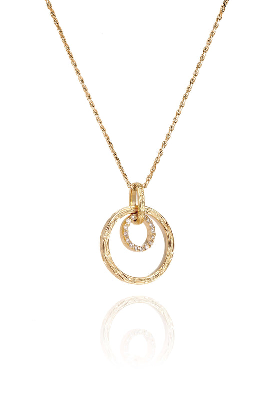 The picture shows a 14K yellow gold two circle infinity scroll pendant with hand engravings and diamonds.