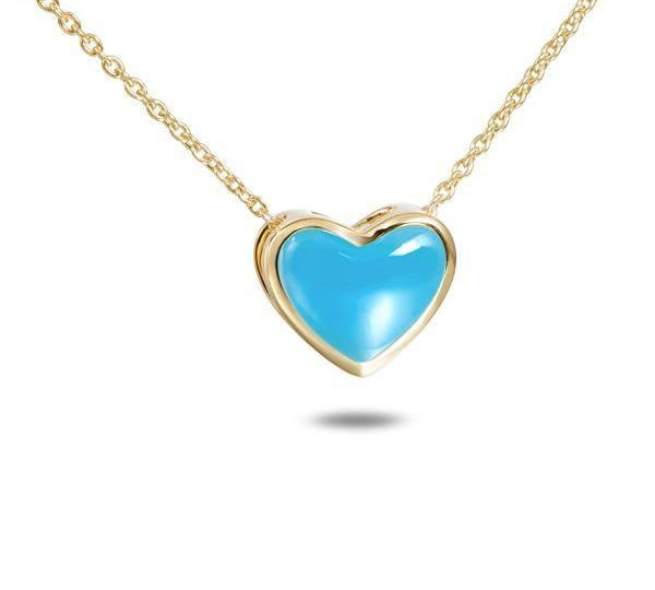 The picture shows a 14K yellow gold larimar heart pendant.