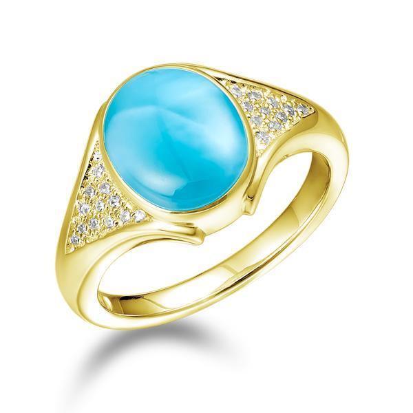 The picture shows a 14K yellow gold larimar cocktail ring with diamonds.