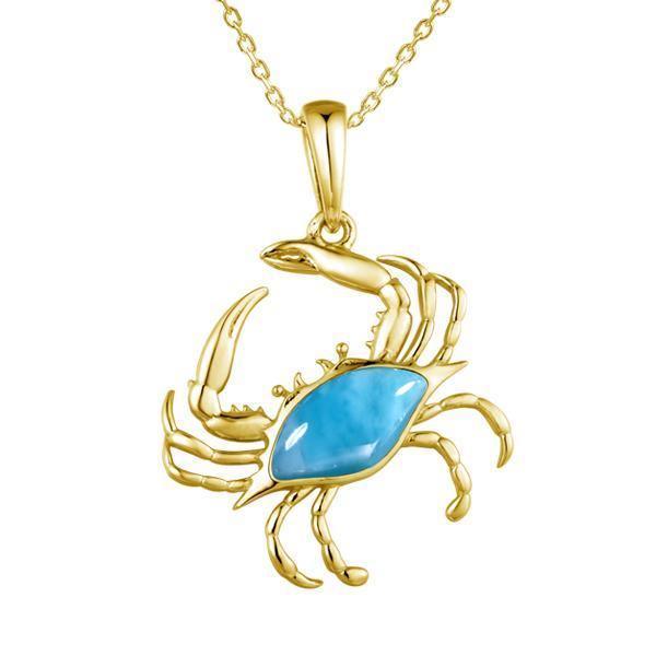 The picture shows a 14K yellow gold larimar blue crab pendant.