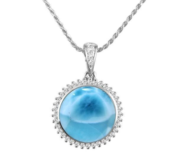 The picture shows a 14K white gold larimar circle pendant with diamonds.