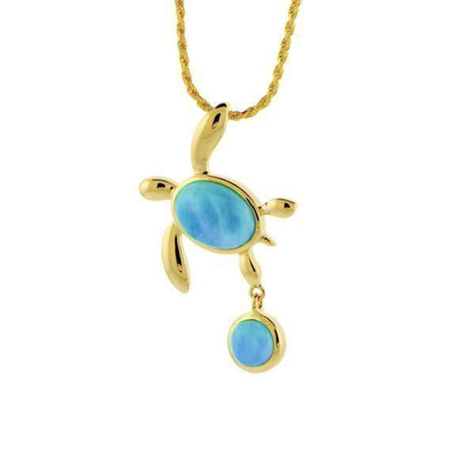 The picture shows a 14k yellow gold sea turtle and a drop of water pendant with two larimar gemstones.