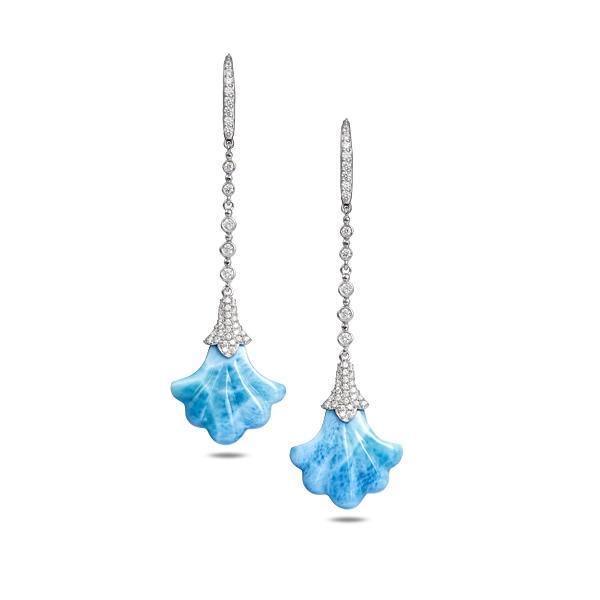 In this photo there is a pair of 14k white gold Hawaiian lily earrings with blue larimar gemstones and diamonds.