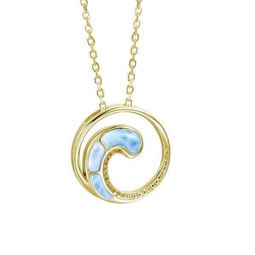 In this photo there is a yellow gold circle pendant with a wave and blue larimar gemstones.