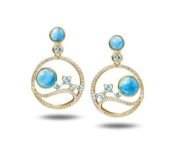 In this photo there is a pair of 14k yellow gold wave and sun earrings with blue larimar, aquamarine, and diamonds.