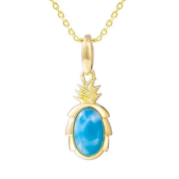 In this photo there is a yellow gold pineapple pendant with one blue larimar gemstone.