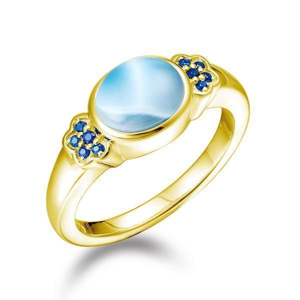 The picture shows a 14K yellow gold larimar circle ring with sapphire.