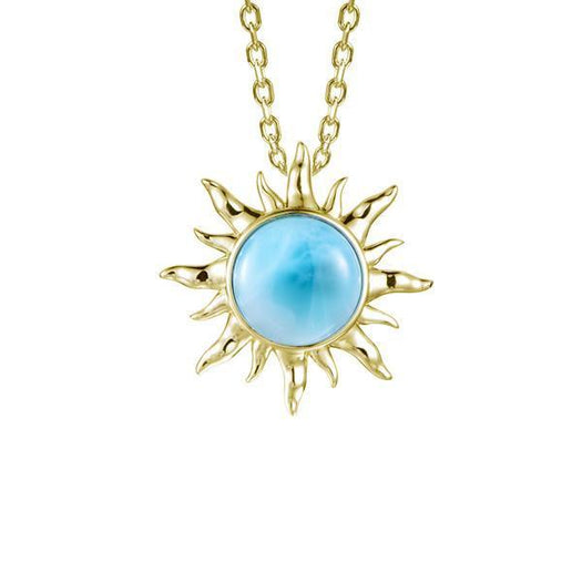 In this photo there is a pair of yellow gold sun pendant with one blue larimar gemstone.