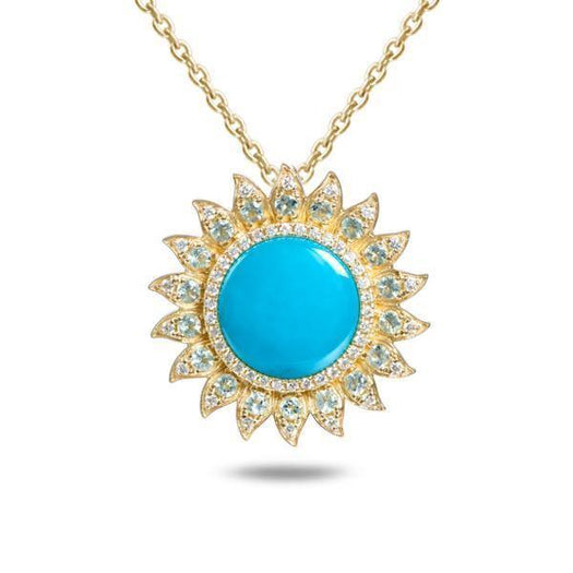 In this photo there is a yellow gold sunflower pendant with one blue larimar gemstone, diamonds and aquamarine.
