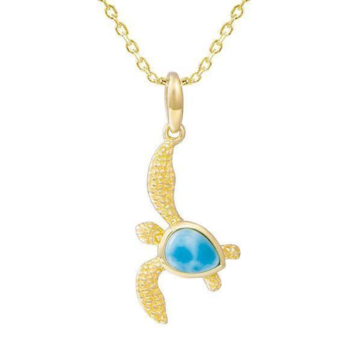The picture shows a 14K yellow gold sea turtle pendant with a larimar gemstone.