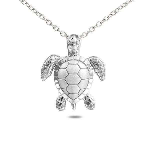 The picture shows a 14K white gold sea turtle pendant with diamonds.