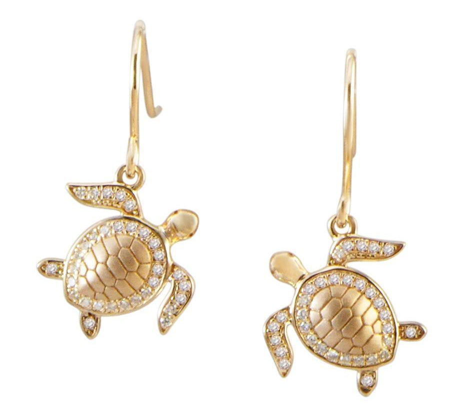 The picture shows a pair of 14K yellow gold sea turtle hook earrings with diamonds.