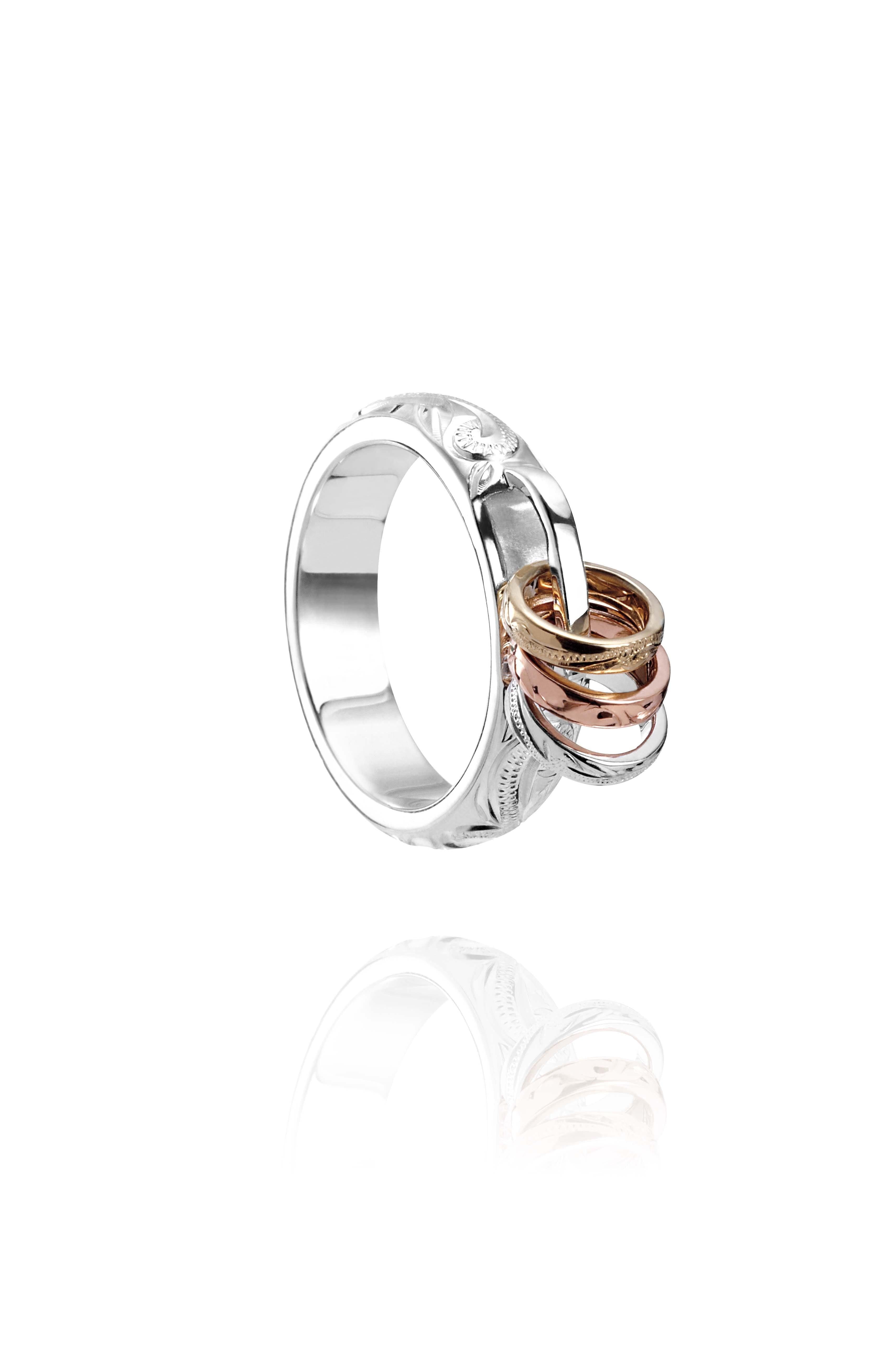 The picture shows a 14K white, yellow, and rose gold mini hoop tri-color ring.