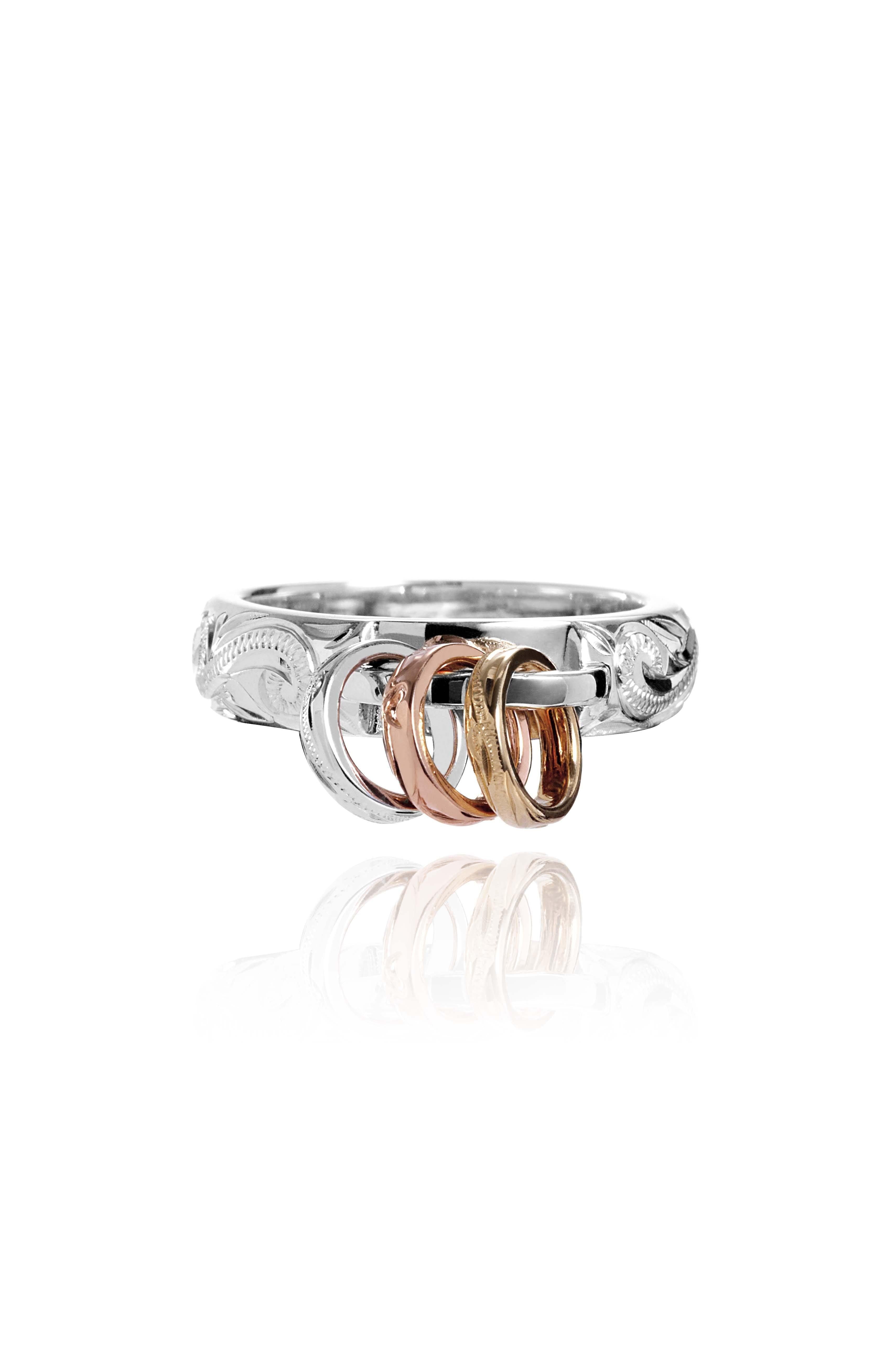 The picture shows a 14K white, yellow, and rose gold mini hoop tri-color ring.