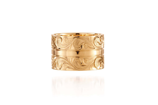 The picture shows a 14K yellow gold 12 mm ring with hand engravings.